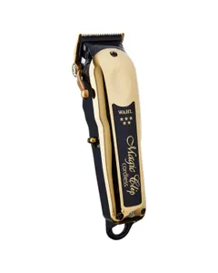 The Magic Clip cordless clipper featuring its shiny gold and black design.